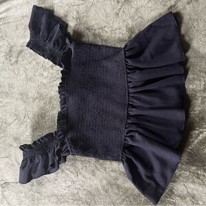 Black Puff Sleeve Smocked Peplum Blouse